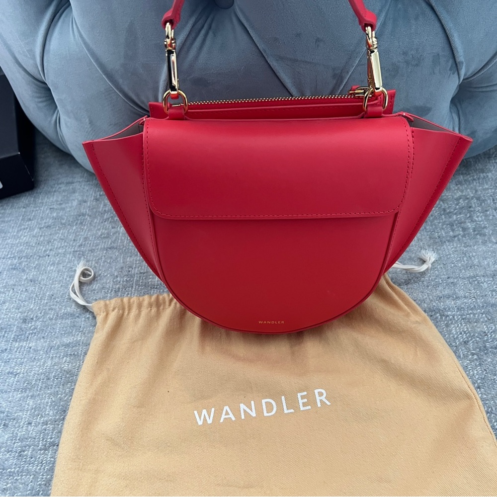Wandler classic moon shaped handbag in bright poppy watermelon red.